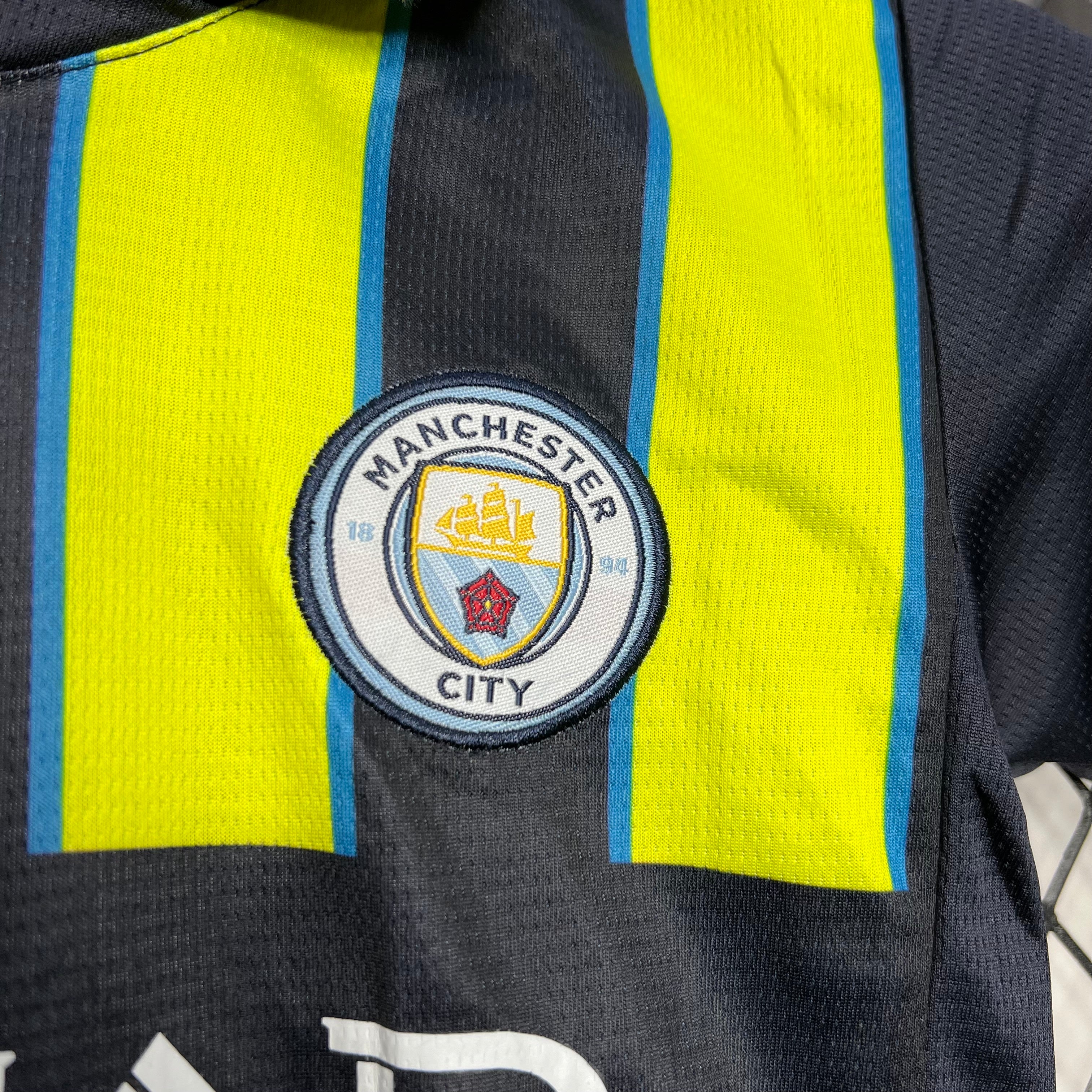 Manchester City 2024-25 Away Kids Kit